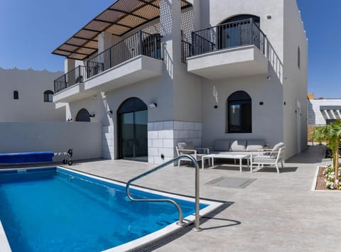 Property building, Patio, Balcony/Terrace, Pool view, Swimming pool