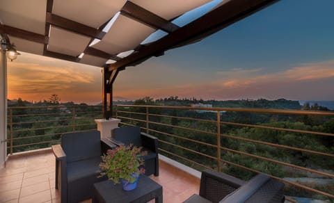 Property building, Patio, View (from property/room), Balcony/Terrace, Seating area, Sunset