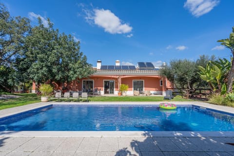 Property building, Living room, Swimming pool