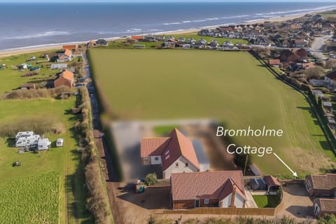 Property building, Beach, Text overlay, Location
