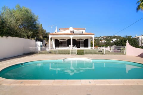 Property building, Living room, Swimming pool