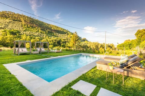 Villa Ester, a Stylish Farmhouse on the Hills Villa in Capannori