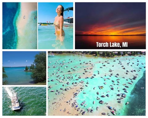 12pm CHECK OUT WINTER Schuss Mountain House in Torch Lake