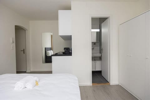 Bed, Kitchen or kitchenette, Bedroom, towels, wardrobe