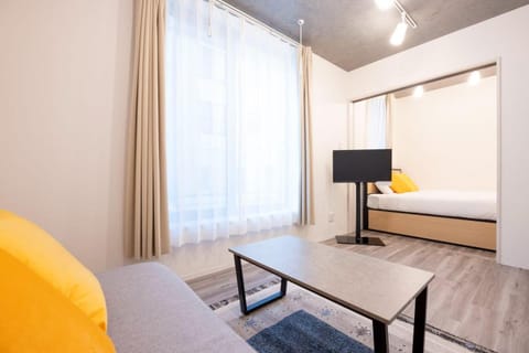 Bed, TV and multimedia, Living room, Photo of the whole room, Seating area, Bedroom, hair dresser