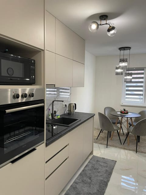 Kitchen or kitchenette, Living room, Seating area, Dining area, dishwasher, minibar, oven, stove