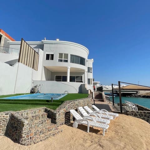 Property building, Patio, Day, Natural landscape, Pool view, Sea view, Swimming pool, sunbed
