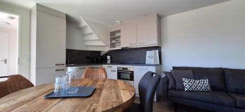 Living room, Seating area, Dining area, stove, kitchen