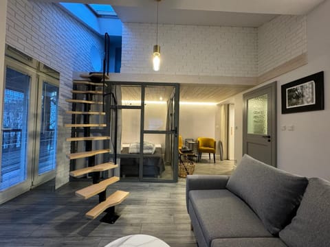 Bed, Living room, Seating area, Bedroom