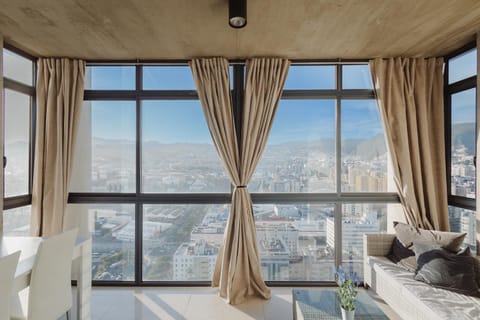 Balcony/Terrace, Living room, Seating area, City view, Mountain view