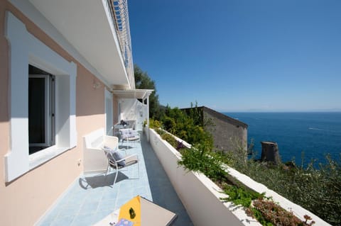 Property building, Patio, Day, Natural landscape, View (from property/room), Balcony/Terrace, Dining area, Sea view