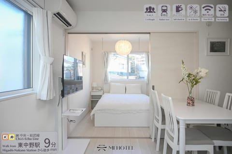 Bed, Dining area, Text overlay, air conditioner