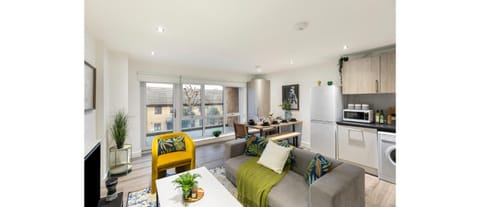 Kitchen or kitchenette, Living room, Seating area, Dining area, oven, stove, toaster, washing machine