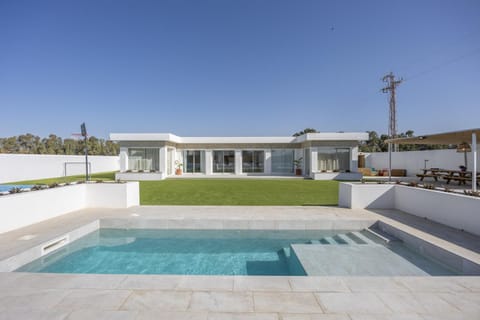 Property building, Living room, Swimming pool
