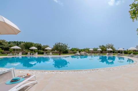 Property building, Living room, Swimming pool