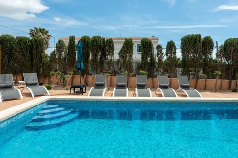 Property building, Living room, Swimming pool