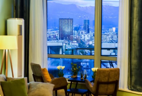 Natural landscape, Living room, Seating area, City view, Mountain view