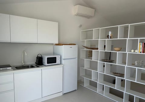 Kitchen or kitchenette, oven, stove