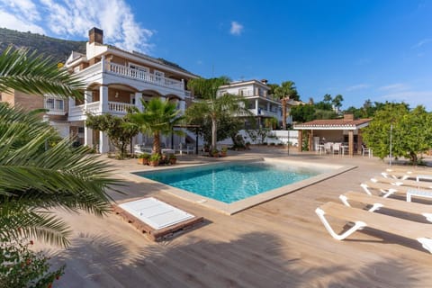 Property building, Living room, Swimming pool