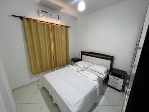 Property building, Bed, View (from property/room), Photo of the whole room, Bedroom, towels, air conditioner