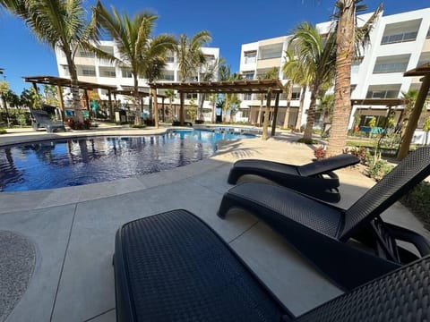 Property building, Natural landscape, Pool view, Swimming pool, sunbed