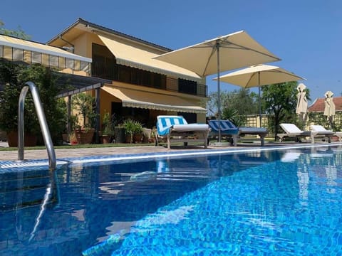 Property building, Pool view, Swimming pool, sunbed