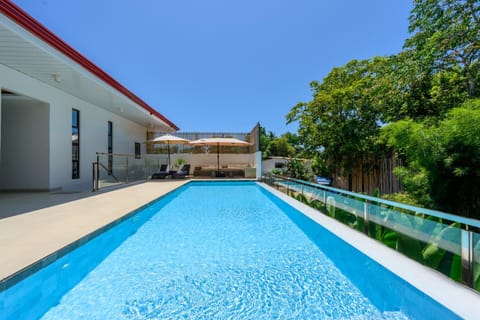 Property building, Pool view, Swimming pool, sunbed