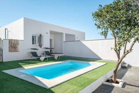 Property building, Living room, Swimming pool