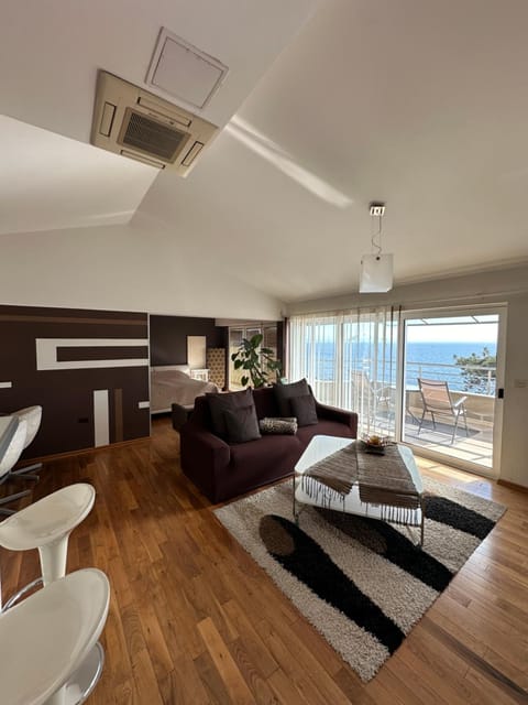 TV and multimedia, Living room, Seating area, Sea view, air conditioner