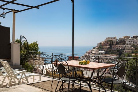 Property building, Patio, Day, Natural landscape, View (from property/room), Balcony/Terrace, Dining area, Sea view