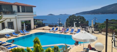 Natural landscape, Beach, Mountain view, Pool view, Swimming pool, sunbed