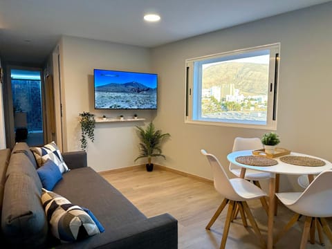 TV and multimedia, View (from property/room), Living room, Seating area, Dining area, Mountain view, Sea view
