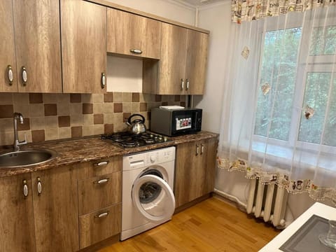 Kitchen or kitchenette, oven, stove