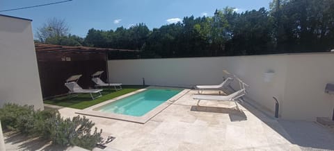 Swimming pool, sunbed