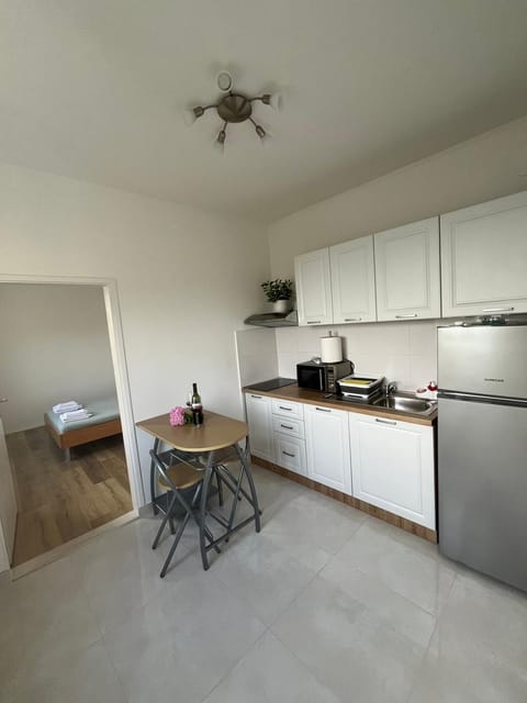 Kitchen or kitchenette, stove