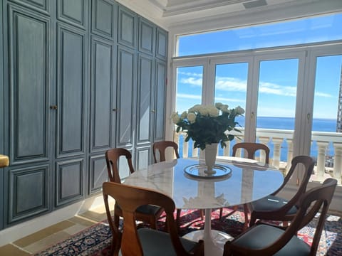 Natural landscape, Living room, Seating area, Dining area, Sea view