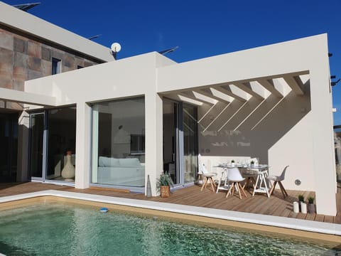 Property building, Patio, Balcony/Terrace, Pool view, Swimming pool
