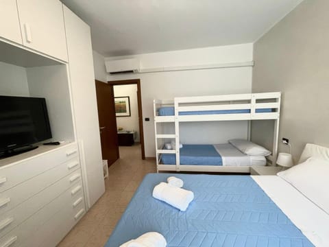 Bed, TV and multimedia, Bedroom, bunk bed, towels, wardrobe