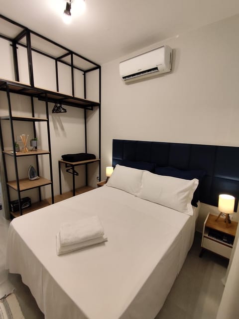 Bed, Photo of the whole room, Bedroom, towels, air conditioner