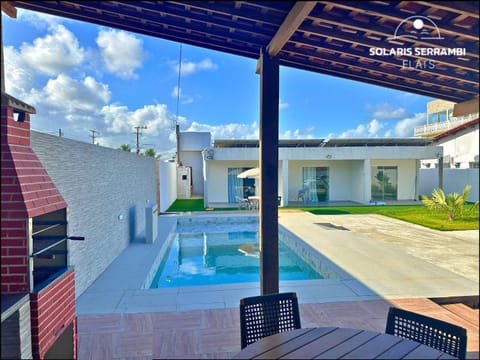 Property building, Patio, Pool view, Swimming pool, sunbed