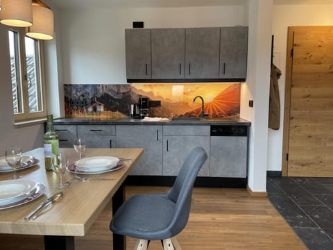 Kitchen or kitchenette, Living room, Seating area, Dining area