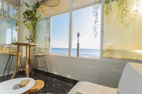 Natural landscape, Living room, Seating area, Dining area, Sea view