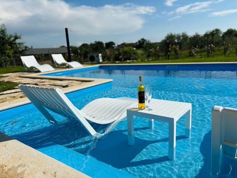 Patio, Day, Natural landscape, Pool view, Swimming pool, Drinks