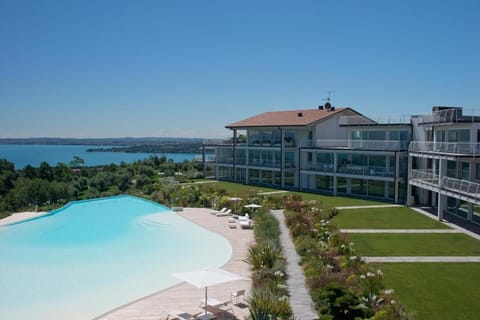 Property building, Day, Natural landscape, Lake view, Pool view, Swimming pool