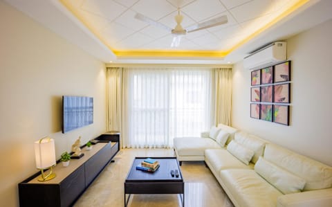 TV and multimedia, Living room, Seating area, fireplace, air conditioner
