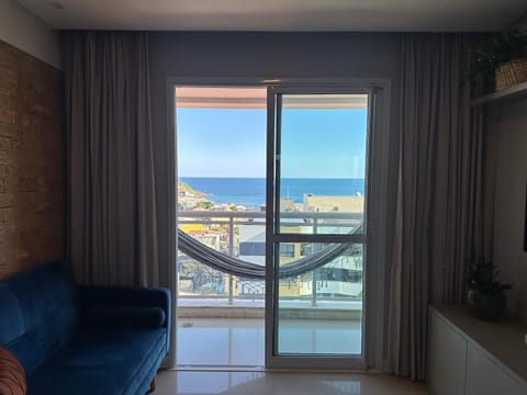 Natural landscape, View (from property/room), Living room, Seating area, Sea view