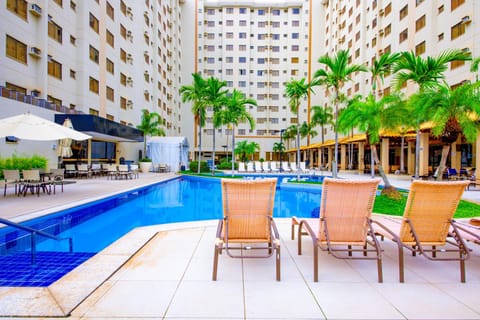 Property building, Day, Pool view, Swimming pool, sunbed
