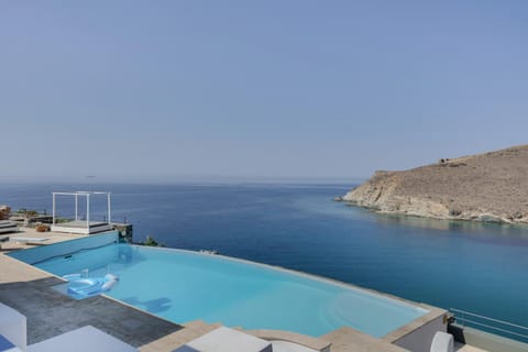 Property building, Living room, Swimming pool