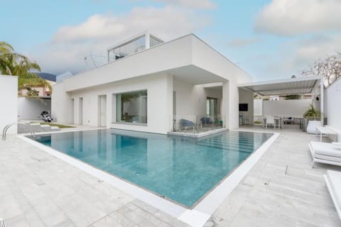 Property building, Living room, Swimming pool