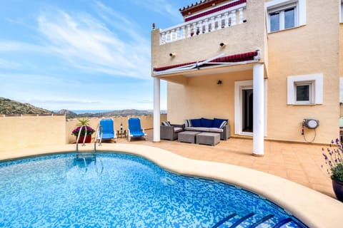 Property building, Living room, Swimming pool